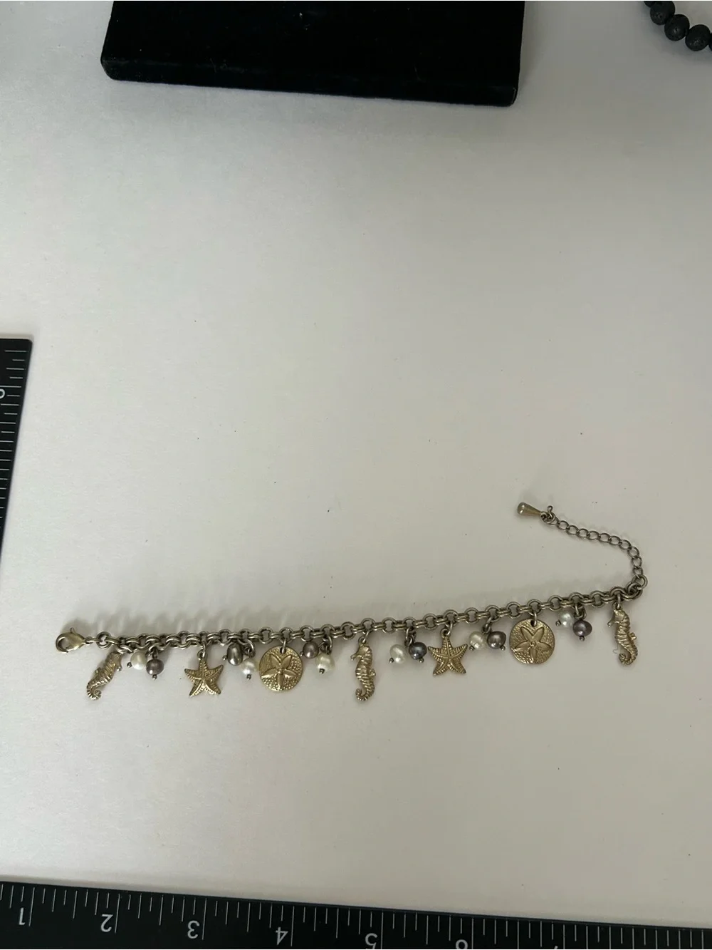 Gold-Tone Under the Sea Lia Sophia Seashell Charm Bracelet with Pearls (6) - Picture 6 of 6